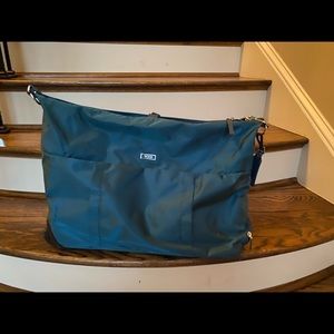 TUMI roller duffle bag